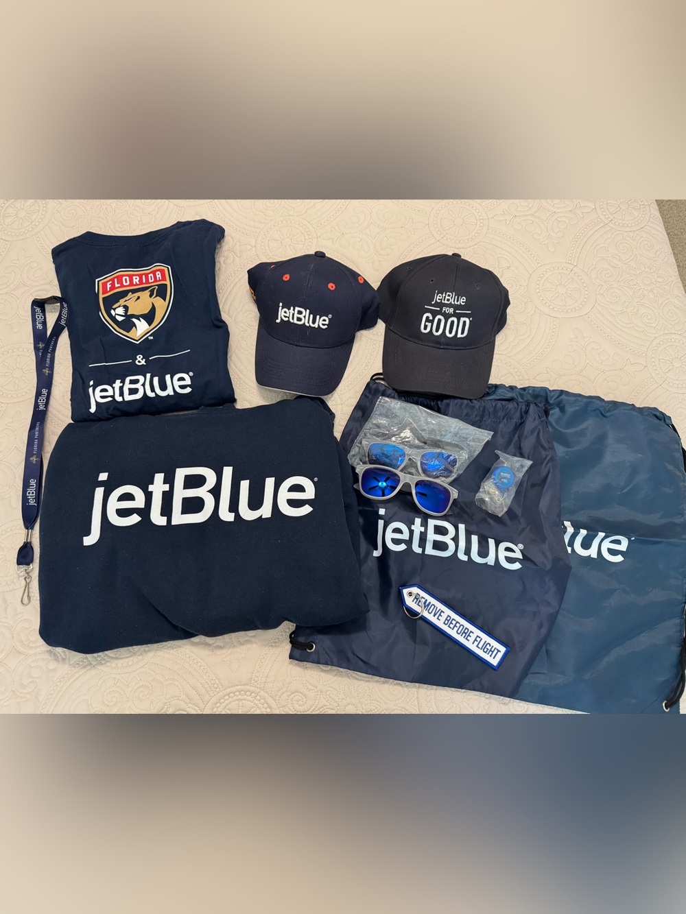 JetBlue Sweatshirt, Florida Panther Tee, Hats, Sunglasses, Drawstring Bags, etc